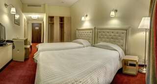Отель Capitol Hotel Бухарест Стандартный двухместный номер с 2 отдельными кроватями-1